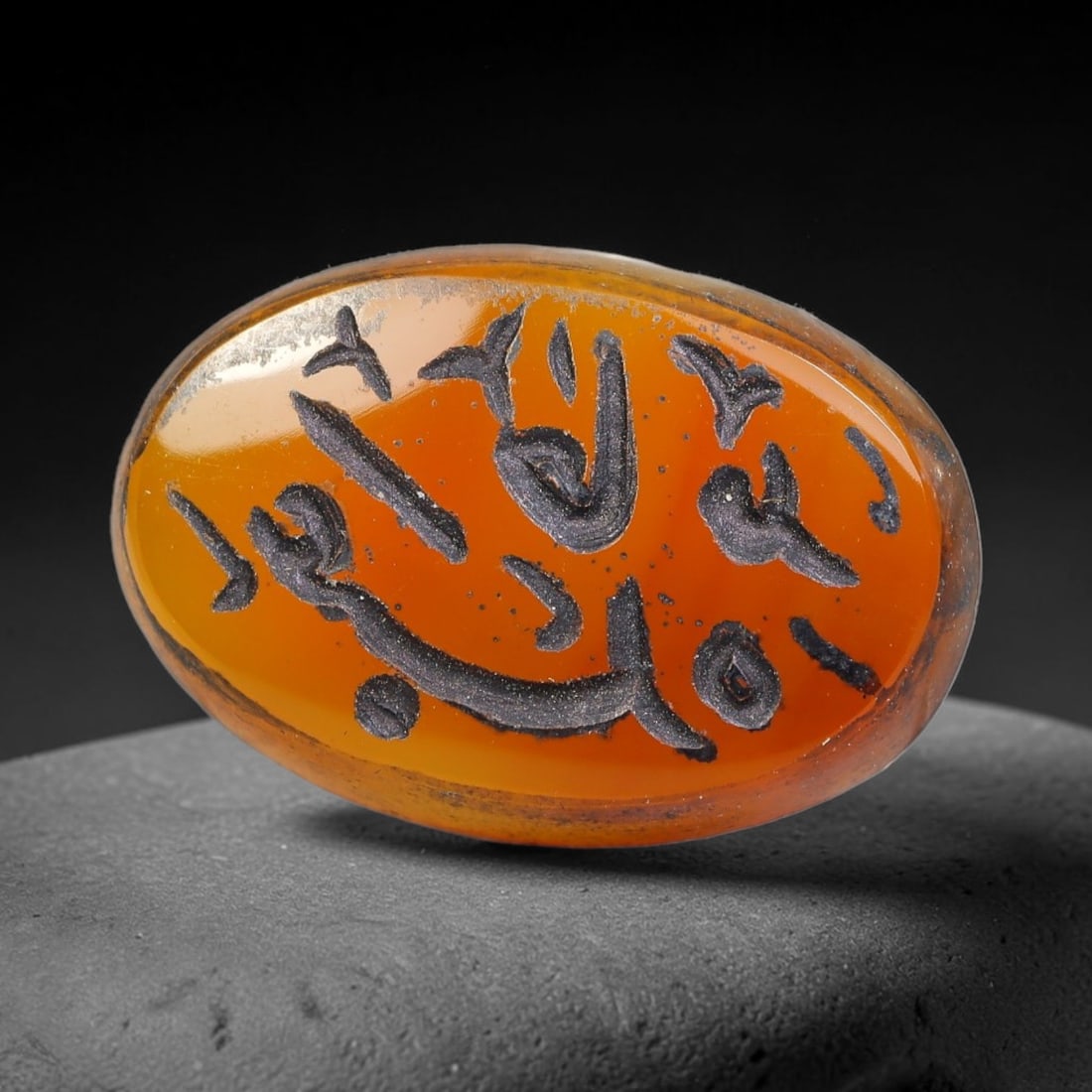 Vintage Mid-Century Carnelian Agate Islamic Calligraphic Intaglio Seal Cabochon Talisman, 47BW: This vintage mid-century natural carnelian agate intaglio seal cabochon draws inspiration from historic Islamic lapidary traditions, crafted as a wearable talisman and seal blank for jewelry setting. 