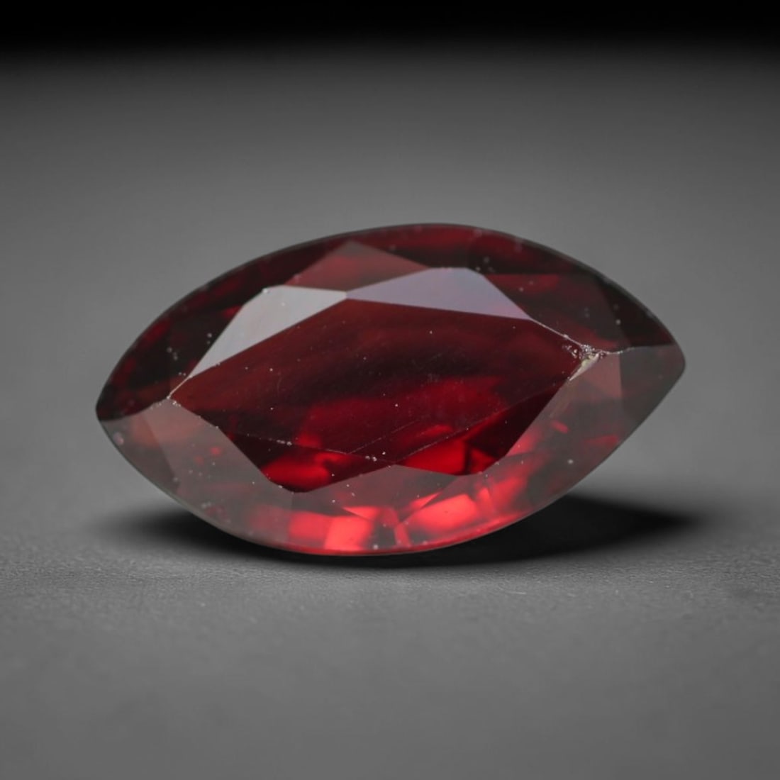 2.54ct Natural Mozambican Deep Crimson Red Faceted Almandine Garnet Loose Gemstone, 85BC: This meticulously faceted garnet features a dense, rich red crystalline body dotted with subtle micro mineral inclusions scattered evenly throughout its transparent interior, precision-cut reflective 