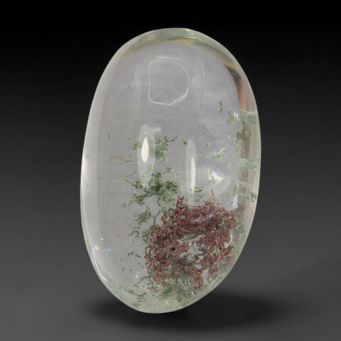 22ct Natural Brazilian Phantom Quartz Oval Cabochon Loose Gemstone, 86BM: This smoothly polished cabochon of natural phantom quartz preserves delicate layered phantom crystal formations enclosed inside transparent quartz host. The domed polished surface offers unobstructed 