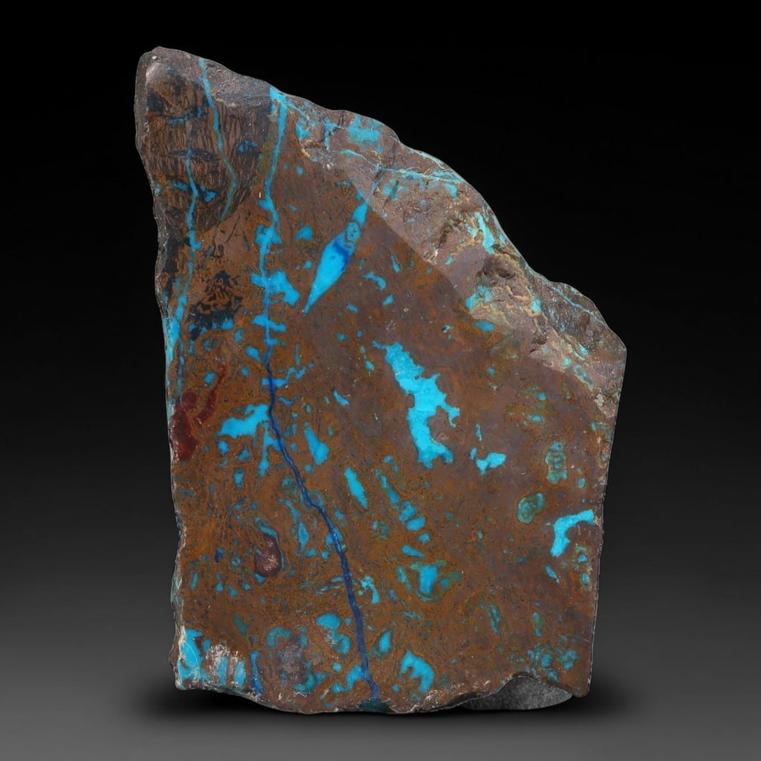 105ct Natural Peruvian Chrysocolla Polished Slab Rough, 79AR: This partial-polished chrysocolla slab features blended mineral matrix with smooth refined face and unaltered natural rugged edge across its 38x28x7mm elongated form, translucent mineral layers hold s