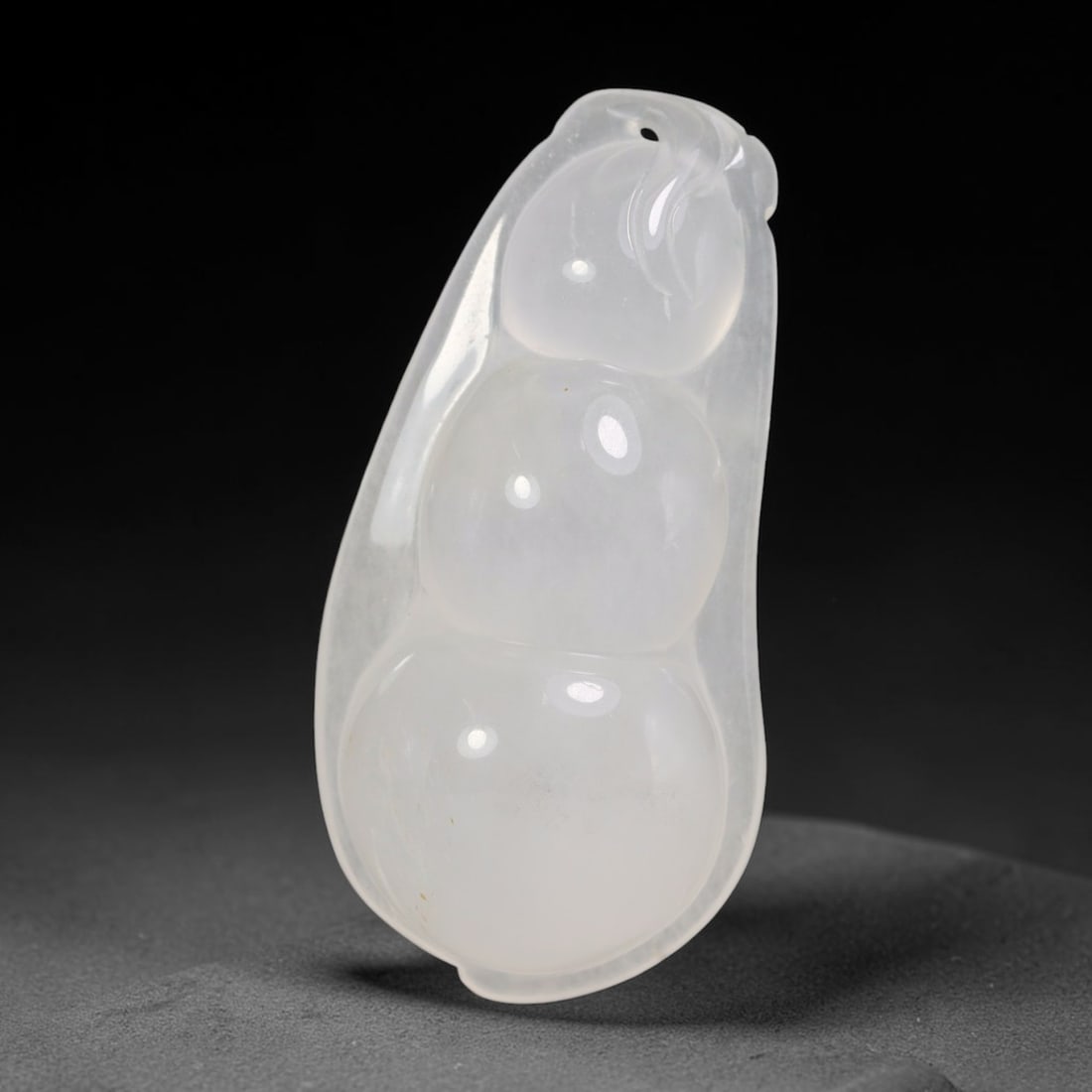 Natural Burmese Quartzite Hand Carved Pendant, 17BP: Artisan hand-carved natural Burmese quartzite pendant measuring 51x25 mm. Expertly shaped and polished by master craftsmen, showcasing excellent natural crystalline clarity with subtle native mineral 