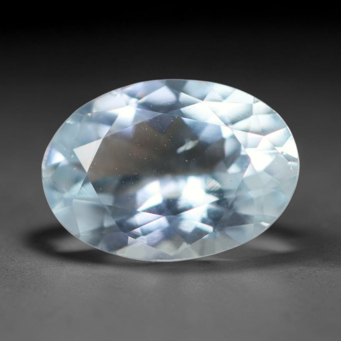 1.92ct Natural Brazilian Sky Blue Faceted Aquamarine Loose Gemstone, 9BC: This precisely faceted aquamarine boasts clear translucent pale sky blue body tone with subtle thin mineral needle and tiny scattered crystalline specks visible within its polished reflective planes i