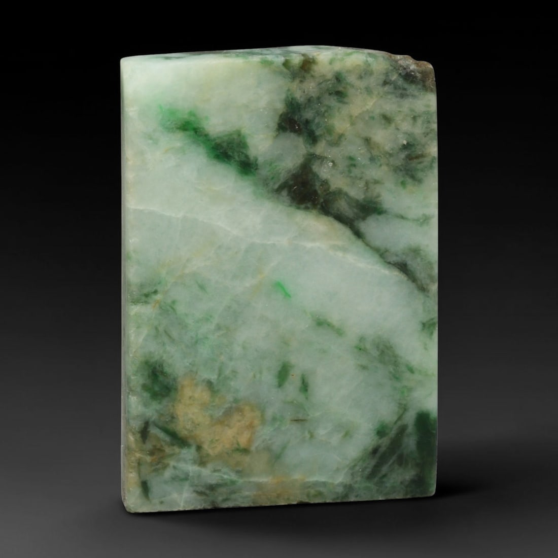 245ct Natural Type A Burmese Jadeite Jade Sliced Rough, 80EF: This specimen is a sliced rough block of natural Type A Burmese jadeite jade. The interior displays natural colour zoning with visible mineral veining and crystalline patterns typical of unprocessed j