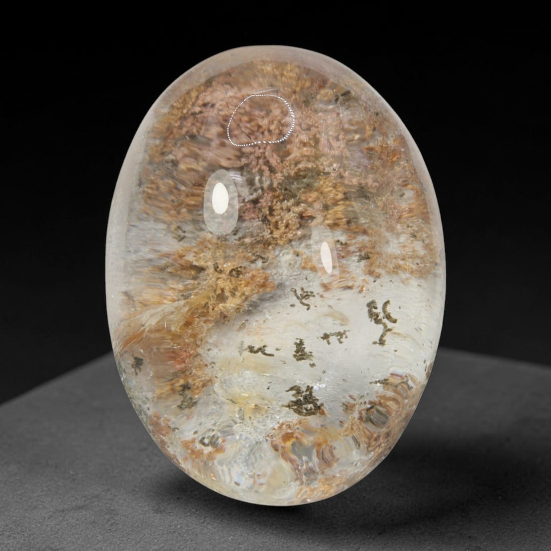 32ct Natural Brazilian Phantom Quartz Oval Cabochon Loose Gemstone, 35BM: This smoothly polished cabochon of natural phantom quartz preserves delicate layered phantom crystal formations enclosed inside transparent quartz host. The domed polished surface offers unobstructed 