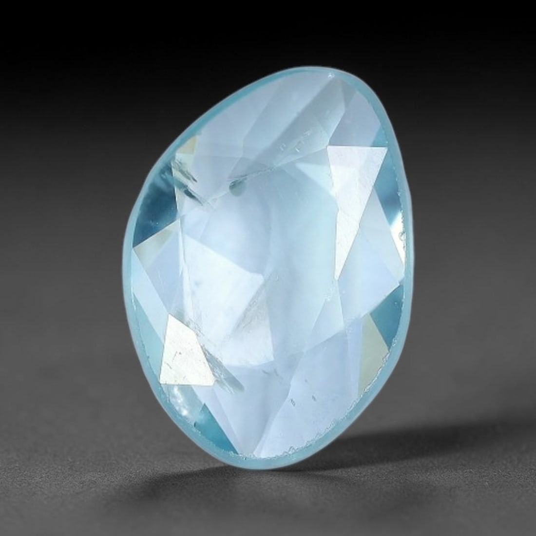 1.67ct Natural Cambodian Blue Zircon Rose Cut Loose Gemstone, 58BV: This fascinating rose cut gemstone is natural blue zircon sourced from Cambodia. The vintage-inspired rose cut facets create soft, diffused light return that beautifully showcases its vivid saturated 