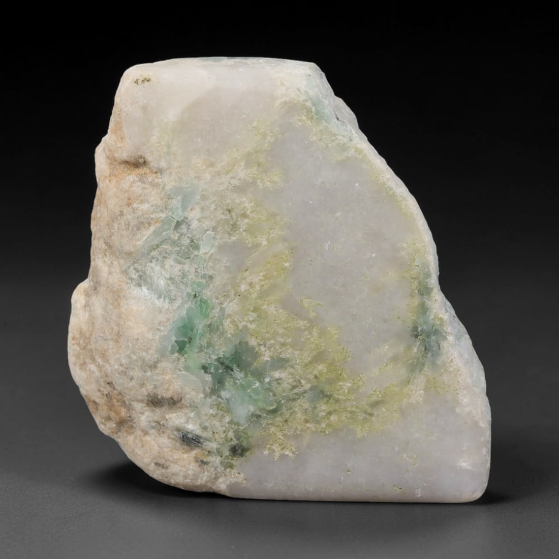 280ct Natural Type A Burmese Jadeite Jade Sliced Rough, 64FD: This specimen is a sliced rough block of natural Type A Burmese jadeite jade. The interior displays natural colour zoning with visible mineral veining and crystalline patterns typical of unprocessed j