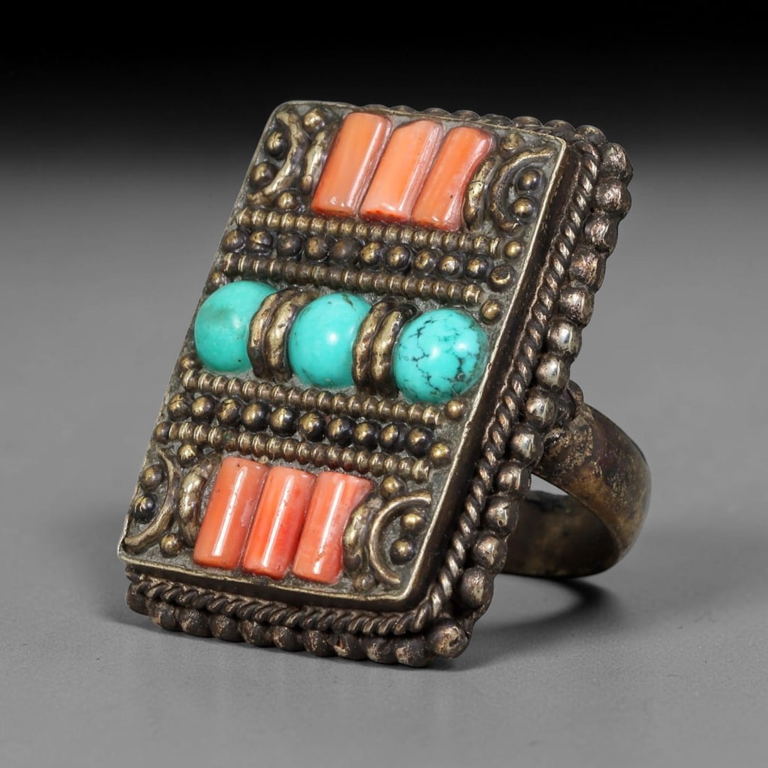 Vintage Tibetan Tribal Silver Plated Gemstone Inlay Ring, US Size 10, 91BY: Vintage Tibetan constructed ring with silver plated metal framework. The face features carefully set natural mineral inlays surrounded by detailed traditional metal ornamentation and textured border d