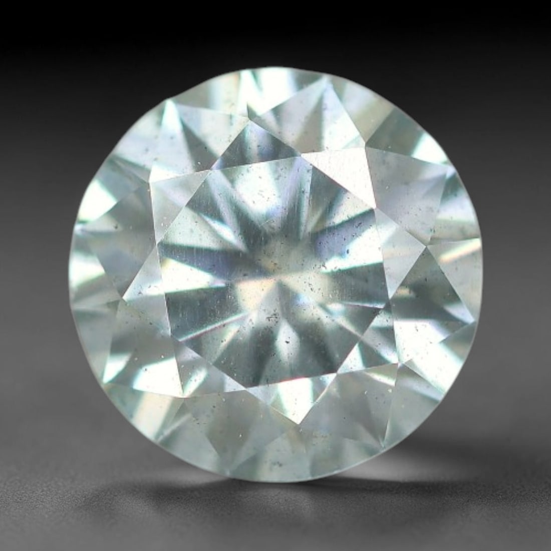 0.96 Carats Natural Light Blue Moissanite Loose Gemstone, 29FP: This lab-grown light blue moissanite features dimensions of 6.5x4mm, crafted from silicon carbide renowned for superior refractive index that delivers intense rainbow sparkle under all light sources. 