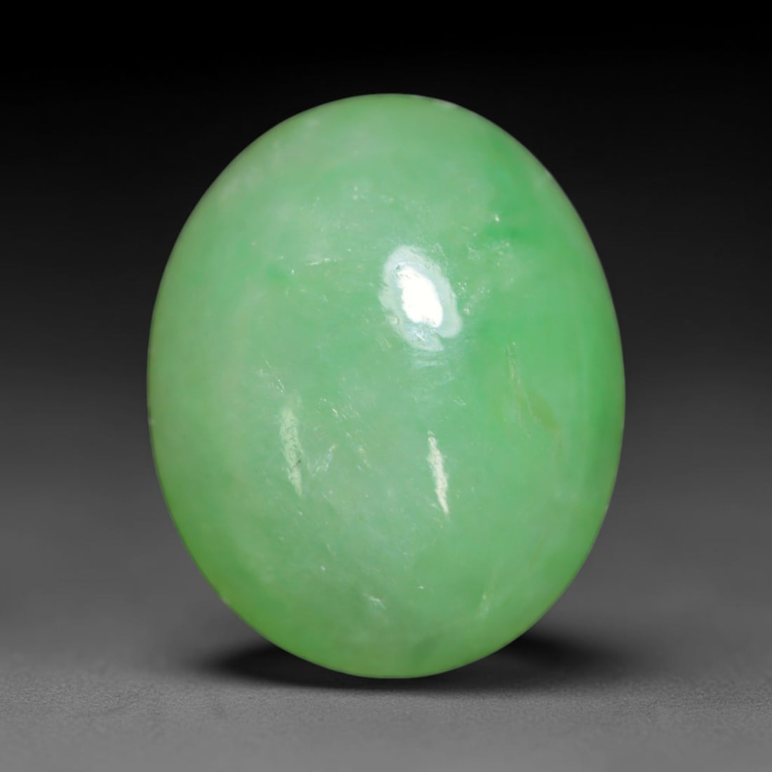 3.37ct Natural Burmese Type A Jadeite Jade Cabochon Loose Gemstone, 60BT: This smoothly polished cabochon is genuine Type A Burmese jadeite jade. It displays soft, even green saturation with gentle natural tonal variation across the polished surface, featuring a fine compac