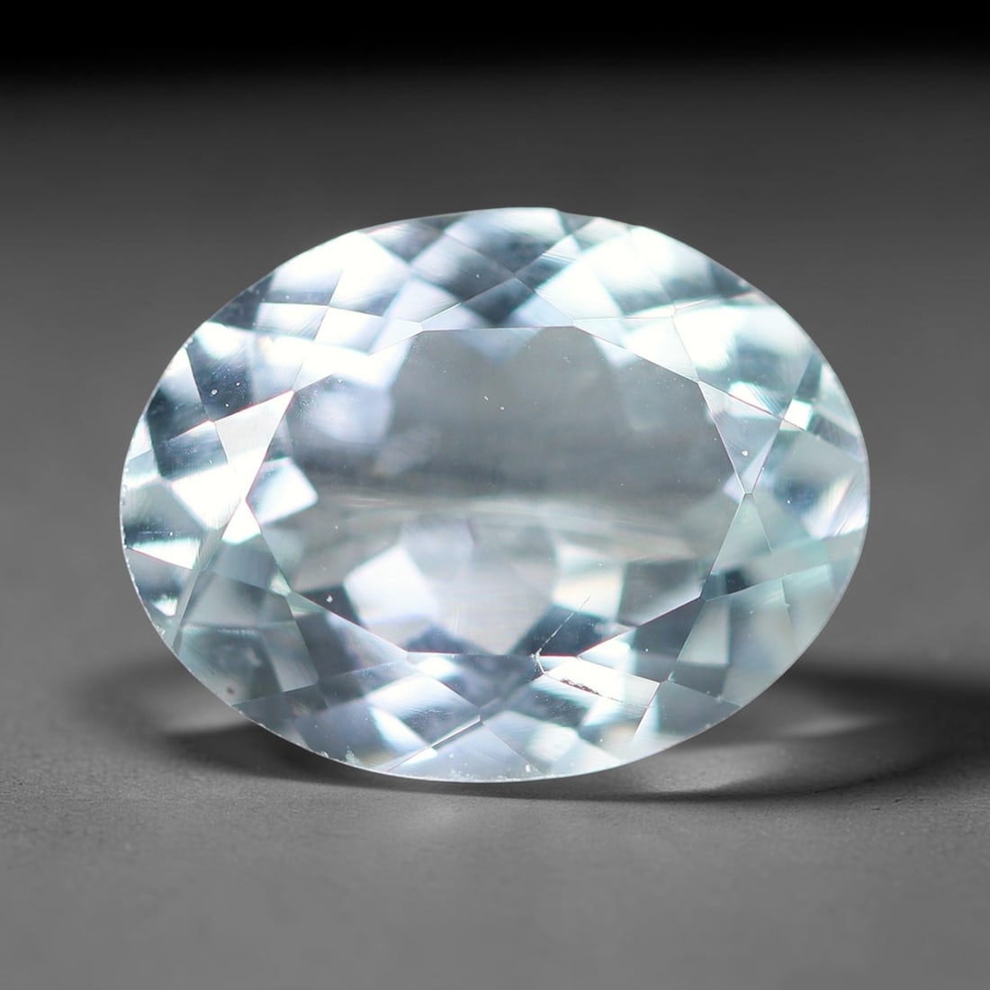 1.89ct Natural Brazilian Sky Blue Faceted Aquamarine Loose Gemstone, 99BD: This precisely faceted aquamarine boasts clear translucent pale sky blue body tone with subtle thin mineral needle and tiny scattered crystalline specks visible within its polished reflective planes i