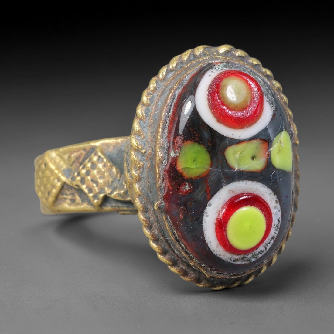 Antique Islamic Millefiori Evil Eye Glass Cabochon Set Vintage Signet Ring (1700-1900 CE), 53AN: The primary collectible value resides within the inset antique millefiori evil-eye glass cabochon, authentic genuine antique glass (distinguished from earlier ancient glass and modern vintage glass) c