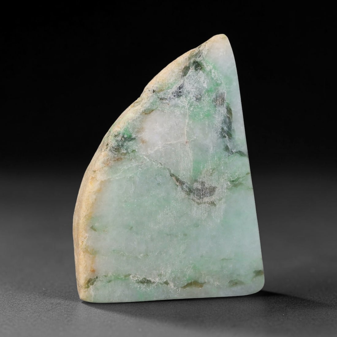 255ct Natural Type A Burmese Jadeite Jade Sliced Rough, 60FD: This specimen is a sliced rough block of natural Type A Burmese jadeite jade. The interior displays natural colour zoning with visible mineral veining and crystalline patterns typical of unprocessed j