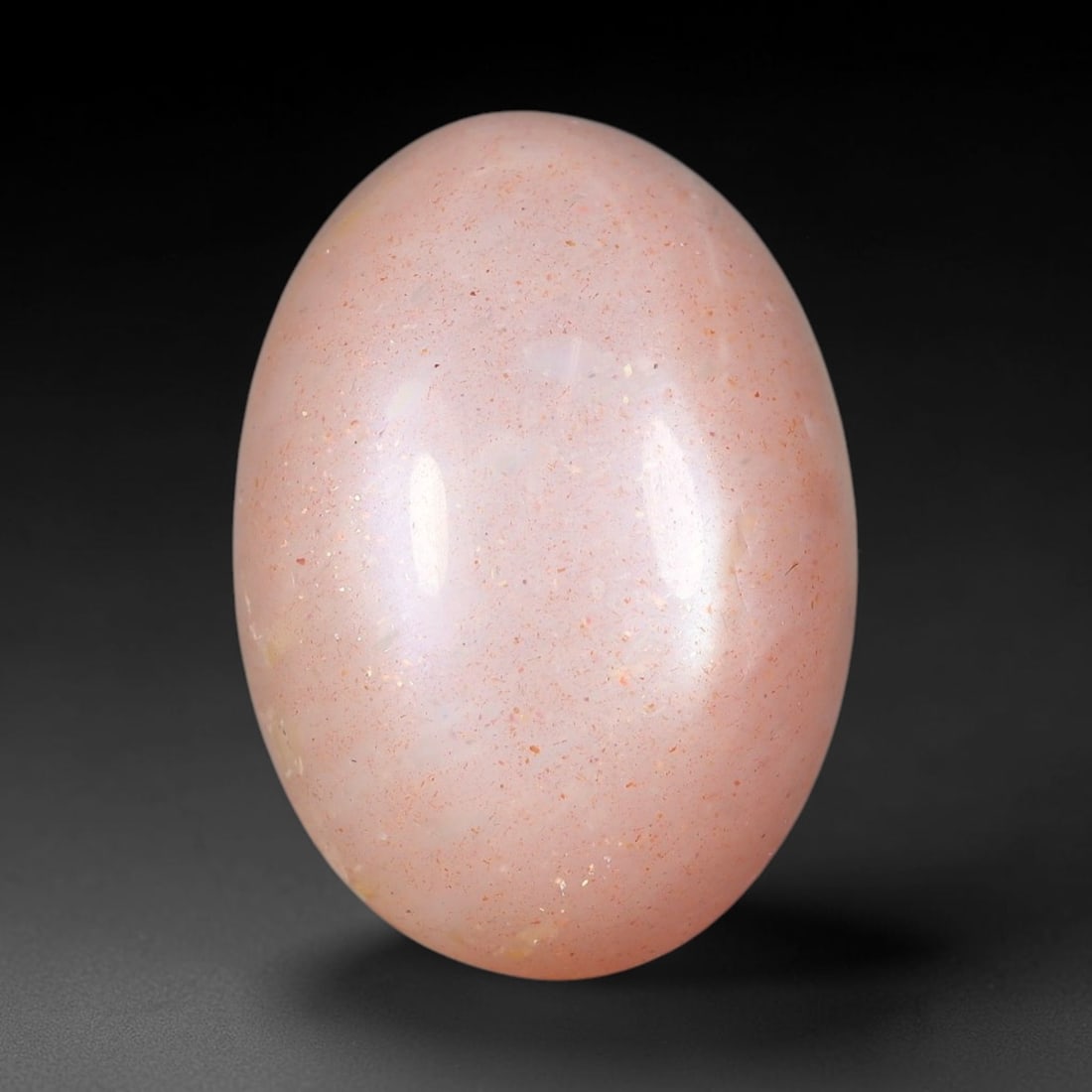 17.50 Carats Natural Ceylon Warm Peach Moonstone Loose Gemstone, 82FE: This natural Ceylon moonstone has dimension measurements of 21x14.8x7.8mm, showcasing a smooth warm peach base tone paired with subtle soft adularescent sheen that glides gently across the polished su