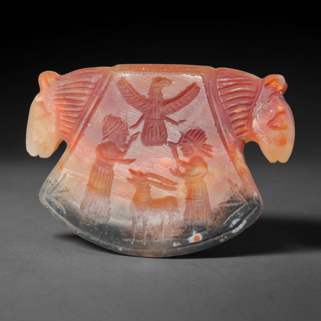 Vintage Natural Carnelian Agate Revival Indo-Persian Glyptic Figural Talisman Amulet Plaque, 42FK: This vintage talisman pendant plaque is skillfully carved from natural banded carnelian agate, crafted in a style referencing ancient Indo-Persian glyptic art traditions. The face bears detailed relie