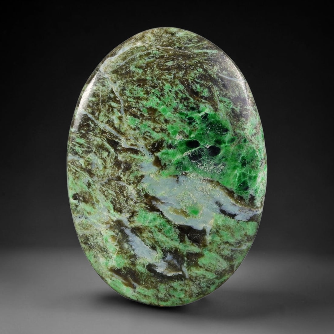 17.33ct Natural Burmese Type A Scenic Moss Green Jadeite Jade Cabochon, 27FA: This single untreated natural Burmese Type A oval jadeite jade cabochon weighs 17.33ct with dimensions of 30x21.3x3.5mm. The stone features a natural landscape pattern with mixed earthy brown, moss gr