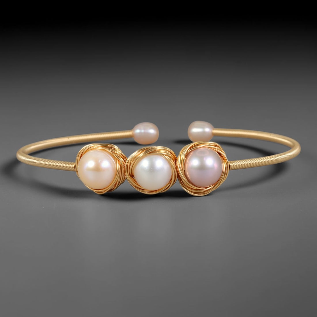 Natural Cultured Freshwater Pearl Gold Plated Wire Wrap Open Cuff Bracelet, 83AC: Handcrafted adjustable open cuff bracelet constructed from polished gold plated metal wire, featuring genuine natural cultured freshwater pearl inlays secured via intricate hand wire-wrapping craft te