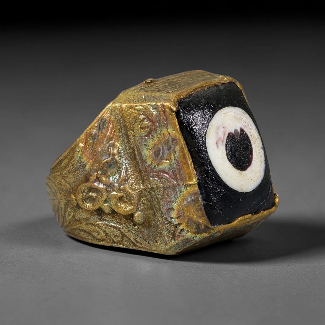 Antique Qajar Dynasty Copper Alloy Ring Set With Banded Glass Bead Cabochon, 64AC: Historic wearable signet ring crafted from textured copper alloy metal, sized to US ring size 10.25, originating from Qajar Persian artistic and adornment traditions of late medieval Iran. Copper allo