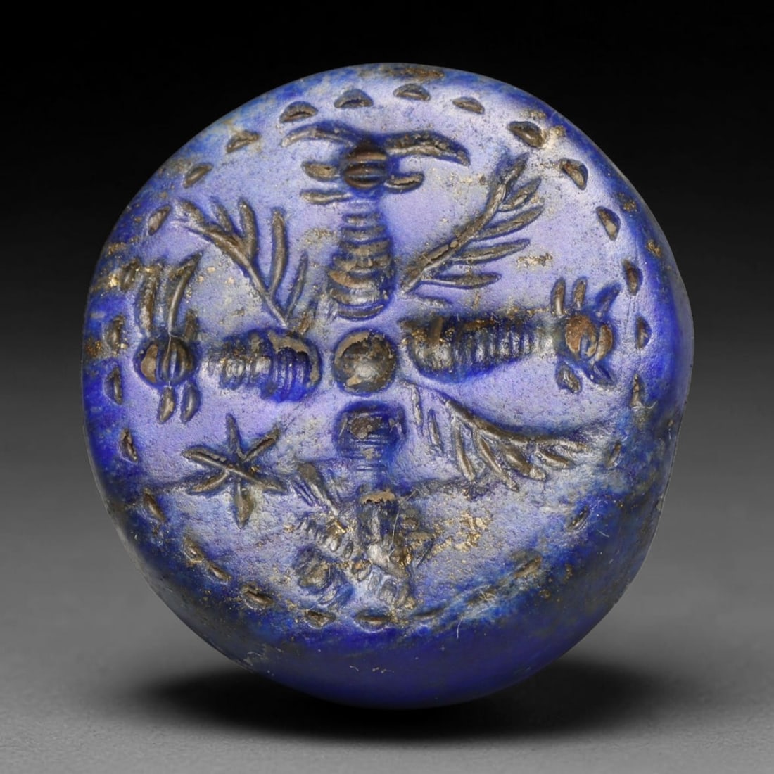 Ancient Sasanian Persian Lapis Lazuli Hemispherical Stamp Seal (224-651 CE), 66EC: This antique hemispherical stamp seal carved from natural lapis lazuli originates from the Sasanian Persian Empire, renowned for luxury hardstone glyptic art crafted for elite personal talismans and o