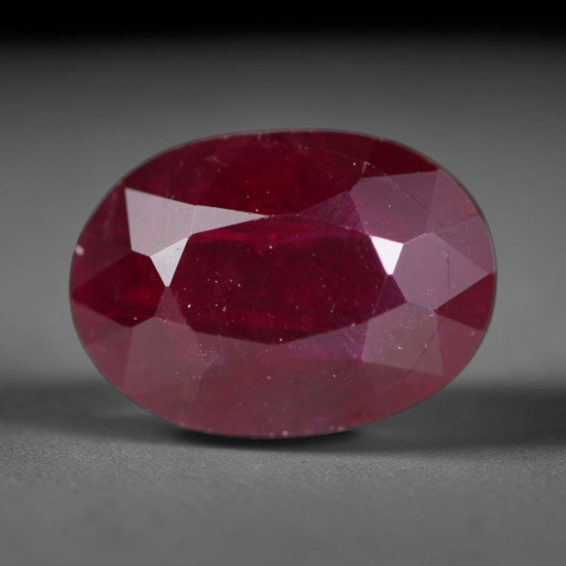 1.36ct Natural Tanzanian Longido Deep Crimson Red Faceted Ruby Loose Gemstone, 17BD: This expertly faceted Longido ruby features a rich deep crimson red body tone with distinct natural linear mineral striations, scattered pale mineral deposits and minor dark mineral flecks visible wit