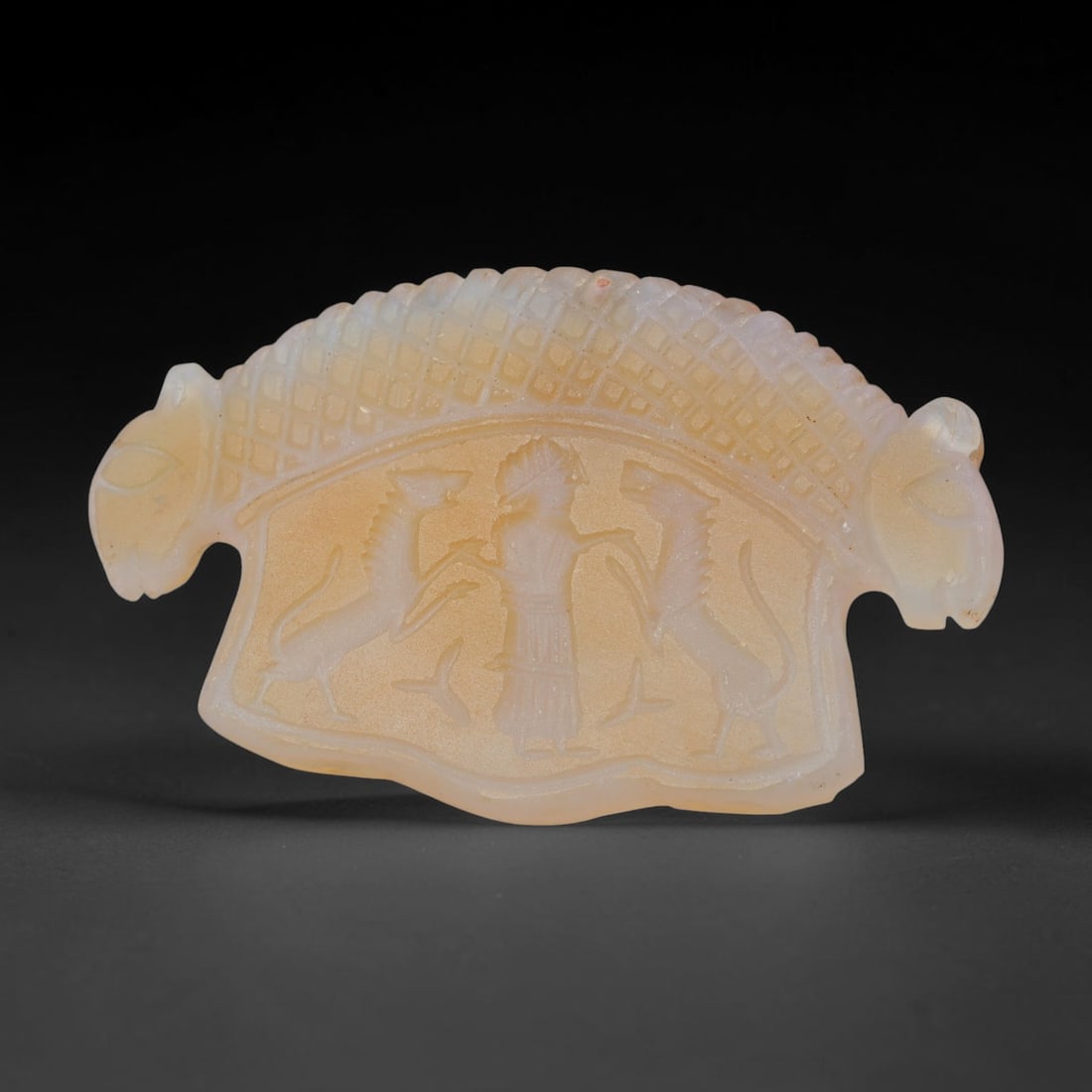 Vintage Natural Carnelian Agate Revival Indo-Persian Glyptic Figural Talisman Amulet Plaque, 40FK: This vintage talisman pendant plaque is skillfully carved from natural banded carnelian agate, crafted in a style referencing ancient Indo-Persian glyptic art traditions. The face bears detailed relie