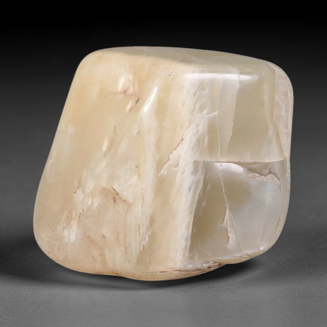61ct Natural Ceylon Pale Cream White Moonstone Rough, 57AH: This smooth weathered moonstone rough carries soft pale cream white translucency with subtle internal silvery adularescent shimmer locked within its naturally tumbled surface, fine faint mineral veini