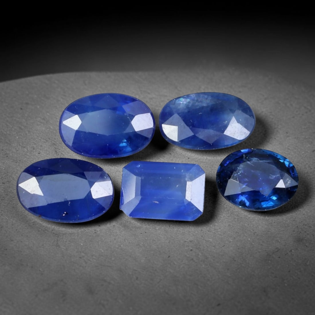 2.48ct Natural Australian Blue Sapphire Loose Gemstone Parcel, 87BV: This parcel consists of natural blue sapphire originating from Australia. The stones display varied cool blue tonal variation across the crystal material, polished with fine faceting to maximise light