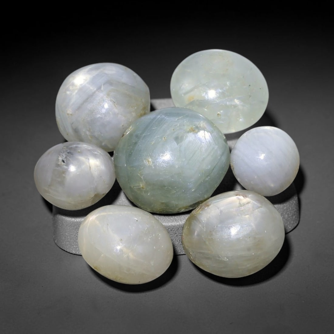 13.17ct Natural Unheated Burmese Star Sapphire Loose Gemstone Parcel, 94FL: This parcel contains natural unheated star sapphire originating from Myanmar. The gem material displays soft pale blue and lavender hues, with characteristic silk inclusions that create the desirable 