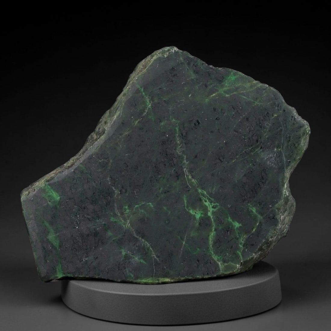 91ct Natural Type A Burmese Jadeite Jade Sliced Rough, 28AZ: This specimen is a sliced rough block of natural Type A Burmese jadeite jade. The interior displays natural colour zoning with visible mineral veining and crystalline patterns typical of unprocessed j
