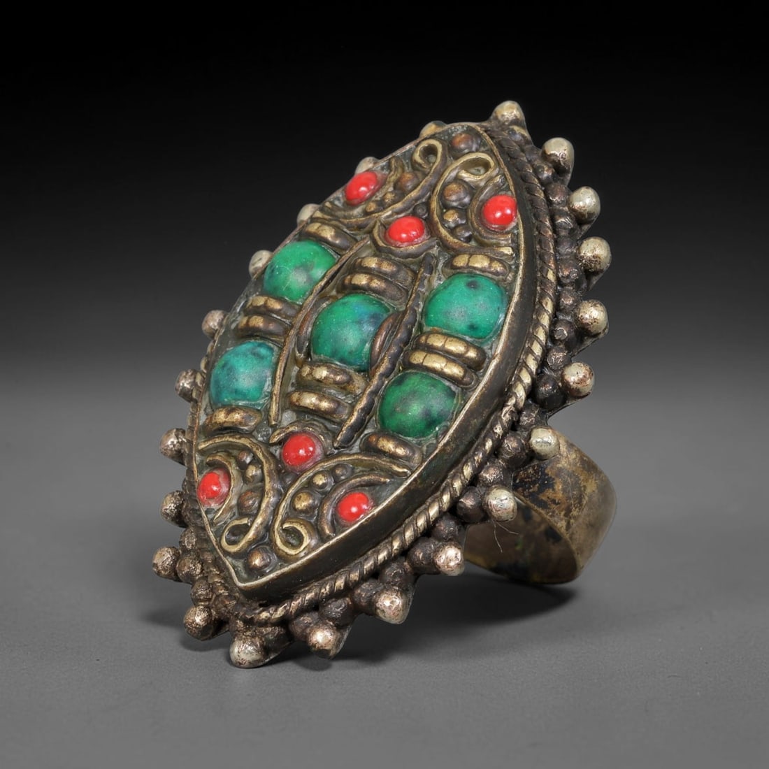 Vintage Tibetan Tribal Silver Plated Gemstone Inlay Ring, US Size 10.5, 100BY: Vintage Tibetan constructed ring with silver plated metal framework. The face features carefully set natural mineral inlays surrounded by detailed traditional metal ornamentation and textured border d