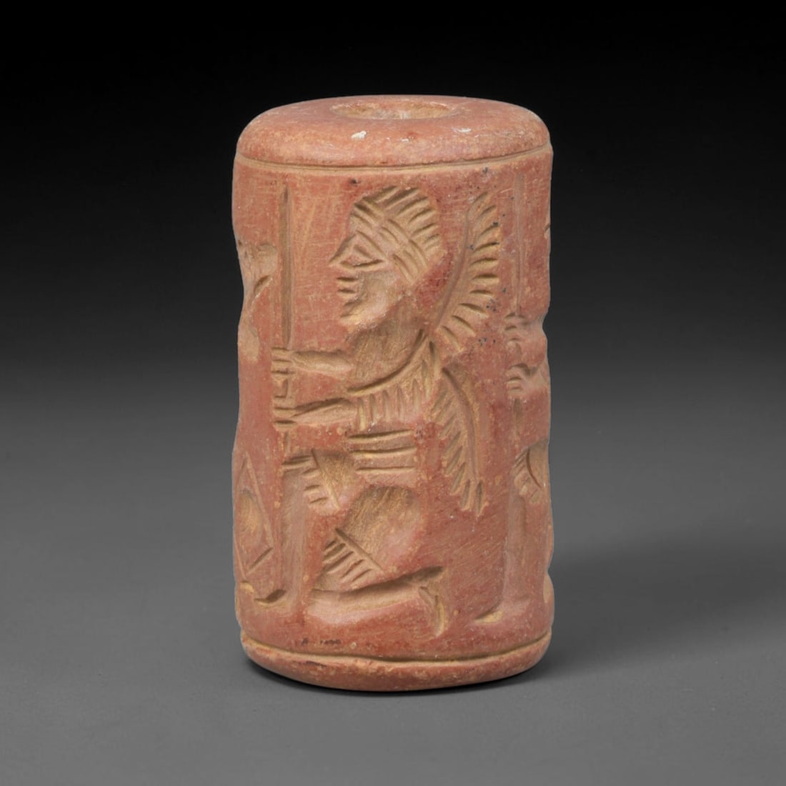 Ancient Assyrian Civilization Stone Cylinder Seal (2500-609 BCE), 46EF: This antique stone cylinder seal originates from Assyrian Civilization of Northern Mesopotamia, crafted to bear official impressions for administrative documentation and worn as protective personal ta