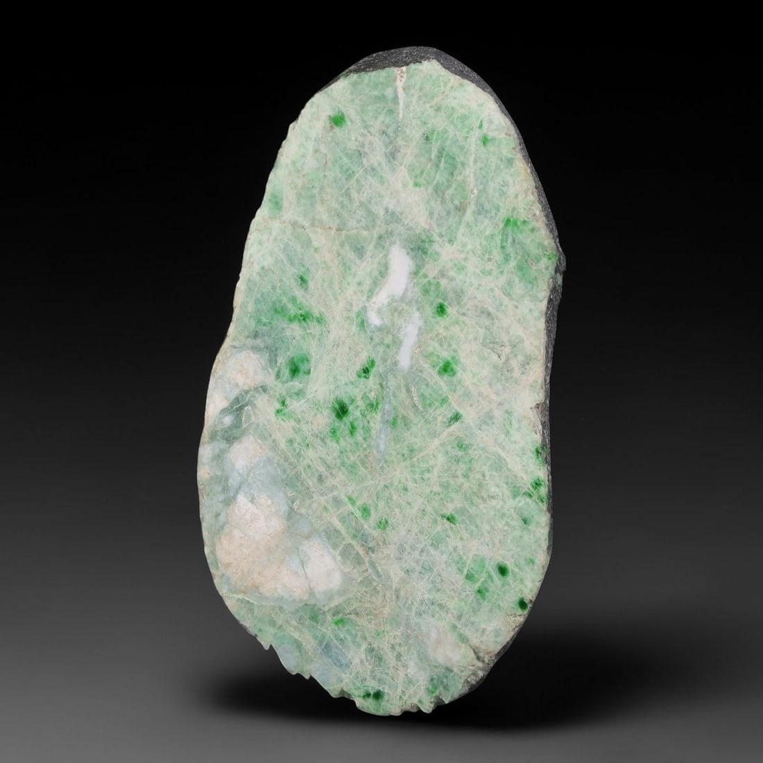 295ct Natural Type A Burmese Jadeite Jade Sliced Rough, 54AZ: This specimen is a sliced rough block of natural Type A Burmese jadeite jade. The interior displays natural colour zoning with visible mineral veining and crystalline patterns typical of unprocessed j