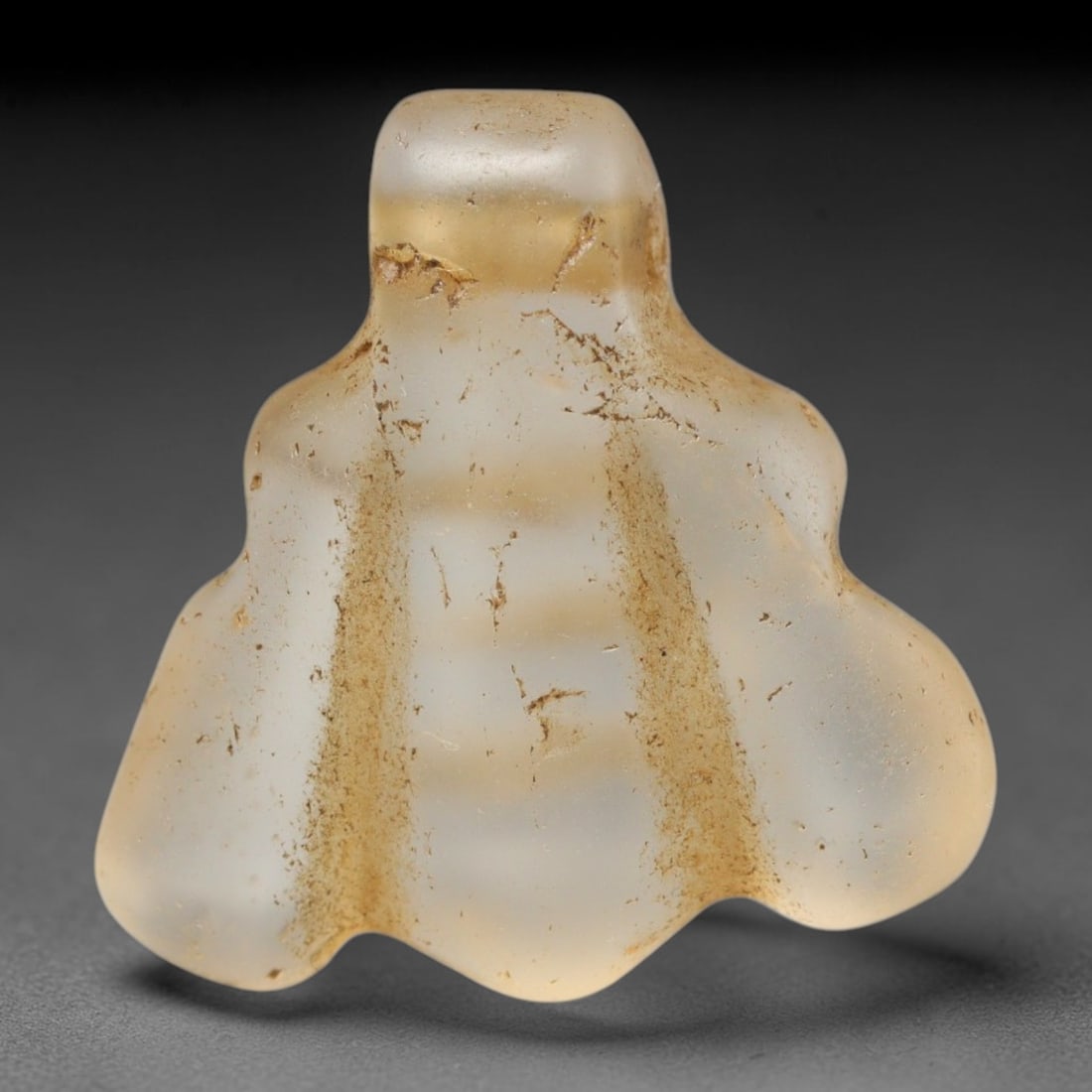 Ancient Medieval Coptic Christian Egyptian Culture Rock Crystal Amulet (300-1000 CE), 75FY: This antique rock crystal amulet originates from Coptic Christian Egyptian Culture, a region with a long-standing tradition of crafting translucent hardstone talismans for devotional and funerary use.