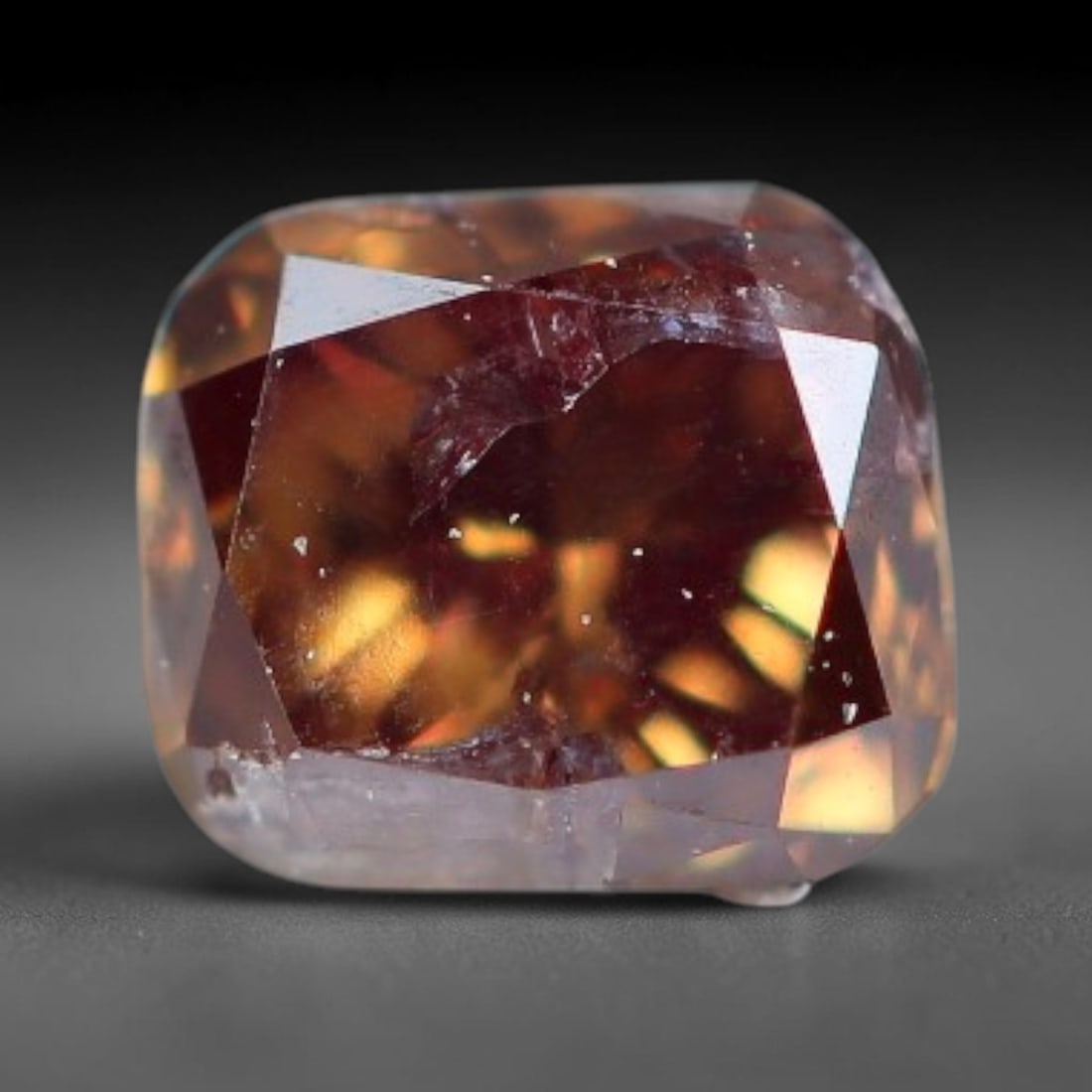 0.18ct Natural Fancy Pinkish Purple Diamond Loose Gemstone, 14BH: This polished natural diamond displays rich pinkish-purple body saturation, with subtle fine microscopic mineral specks distributed within its crystal interior, measured at calibrated dimensions of 3.
