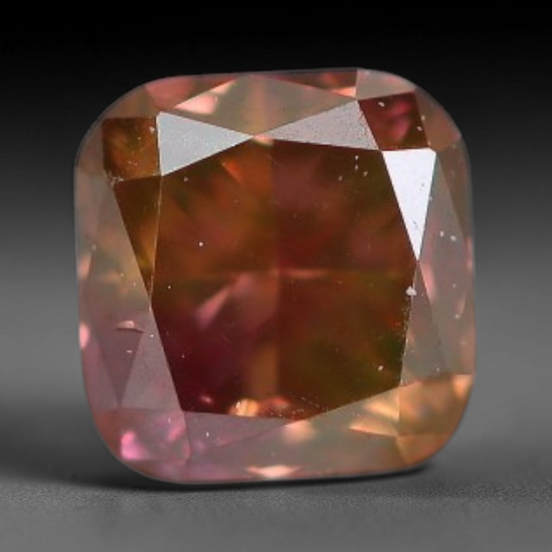 0.14ct Natural Fancy Pinkish Purple Diamond Loose Gemstone, 12BG: This polished natural diamond displays rich pinkish-purple body saturation, with subtle fine microscopic mineral specks distributed within its crystal interior, measured at calibrated dimensions of 2.