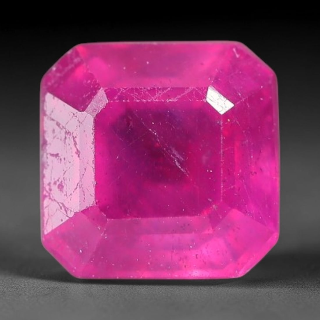 1.67 Carats Natural Madagascar Vivid Fuchsia Red Heated Ruby Loose Gemstone, 58FM: This vivid fuchsia red Madagascar ruby displays rich saturated red tone with subtle natural internal mineral traces that showcase genuine earth-grown character, measured at 6x4.4mm, the intense warm c