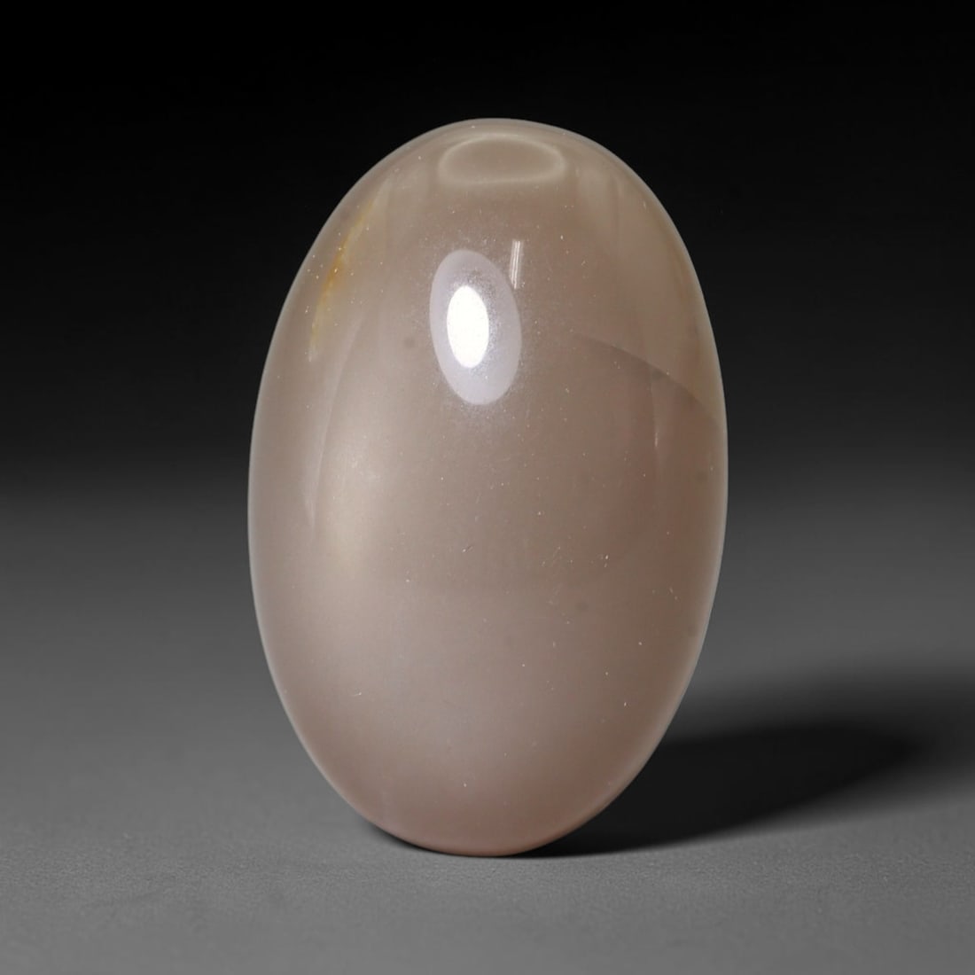 20.71ct Natural Ceylon Grey Moonstone Cabochon Loose Gemstone, 13FY: This natural Ceylon moonstone cabochon carries a soft grey body showcasing classic adularescence. Fine mineral inclusions are visible within the gem. Dimensions measure 21x13x9mm, mined in Sri Lanka, 