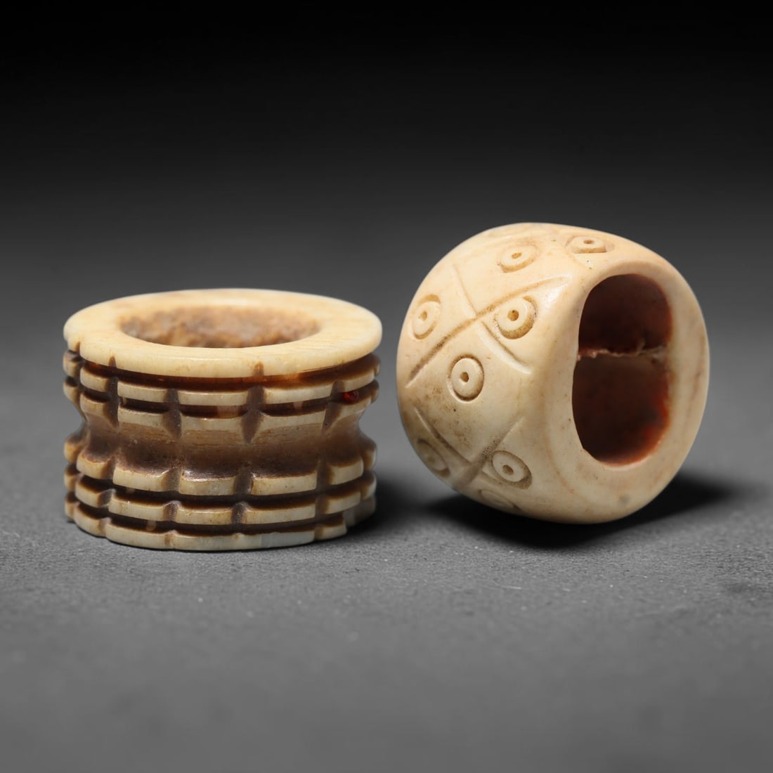 Antique Sino-Siberian Steppe Nomadic Craft Stag Antler Carved Bead Pair (Post 1850s), 17FV: Pair of beads skillfully carved from natural stag antler, originating from Sino-Siberian Steppe Nomadic craft traditions, produced post 1850s. The antler material holds attractive natural aged patina,