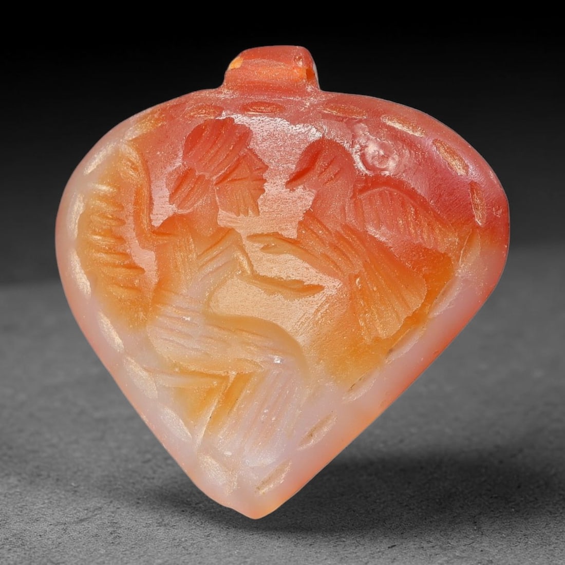 Vintage Natural Carnelian Agate Revival Indo-Persian Glyptic Figural Talisman Amulet Plaque, 43FK: This vintage talisman pendant plaque is skillfully carved from natural banded carnelian agate, crafted in a style referencing ancient Indo-Persian glyptic art traditions. The face bears detailed relie