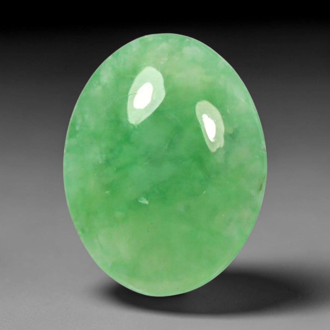 2.81ct Natural Burmese Type A Apple Green Jadeite Jade Cabochon, 100BP: This single loose natural Burmese Type A jadeite jade cabochon with exact dimensions of 12x9.3x3.4mm. It is completely untreated, free of artificial dye, bleaching, or resin filling, preserving the or