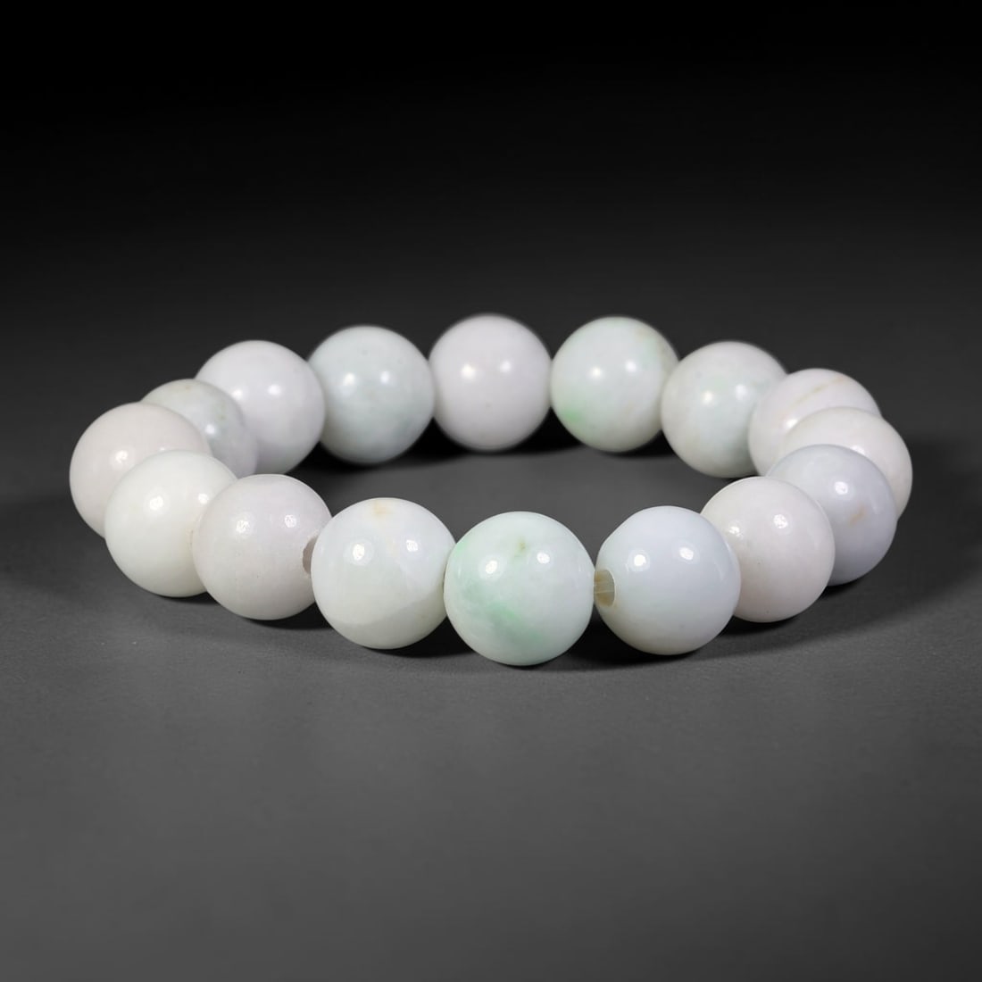 Natural Burmese Type A Jadeite Jade Beaded Bracelet, 21mm Beads, 52BK: Hand-strung bracelet crafted from polished untreated Burmese Type A jadeite jade beads. Every bead features smooth refined polishing with clean centered drill holes for sturdy flexible stringing. Auth