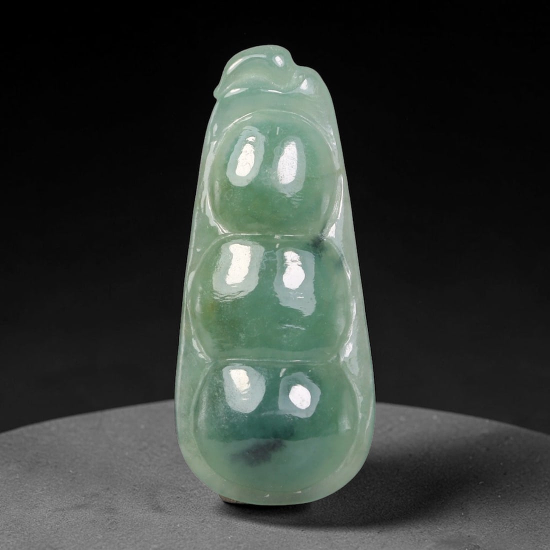 Natural Burmese Type A Jadeite Jade Hand Carved Pendant, 31BQ: Artisan hand-carved untreated Burmese Type A jadeite jade pendant measuring 34x15 mm. Carefully sculpted with detailed relief craftsmanship and finished with a smooth glossy polish. Authentic Type A j