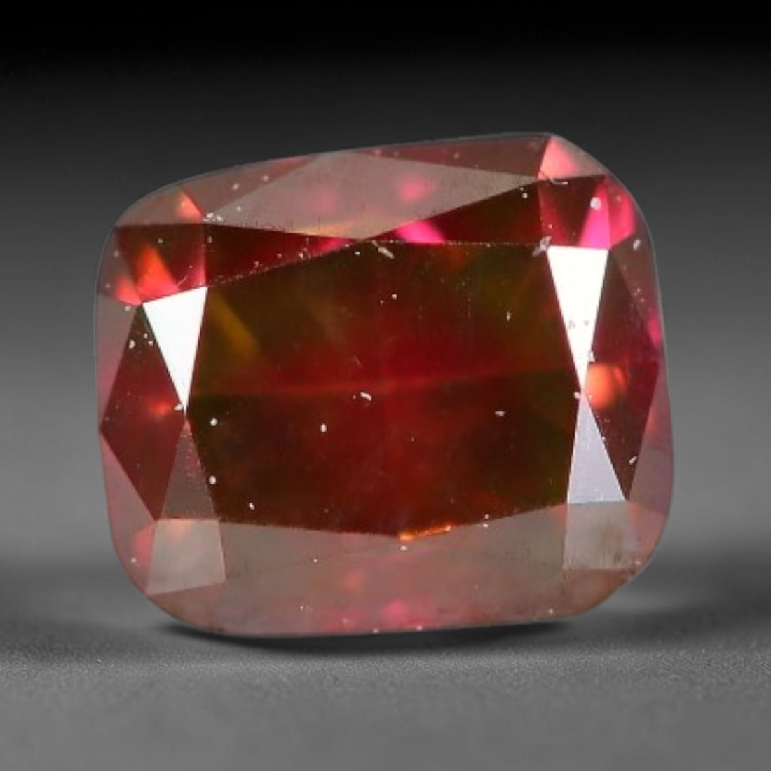 0.26ct Natural Fancy Pinkish Purple Diamond Loose Gemstone, 26BG: This polished natural diamond displays rich pinkish-purple body saturation, with subtle fine microscopic mineral specks distributed within its crystal interior, measured at calibrated dimensions of 3.