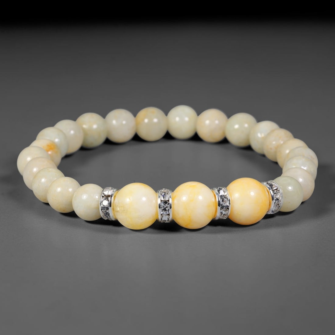 Natural Burmese Type A Jadeite Jade Beaded Bracelet, 19FJ: Crafted from polished natural jadeite jade round beads with soft creamy and pale natural tones. Each bead measures 8mm, arranged into a flexible wearable strand. Clean and elegant, this bracelet is su