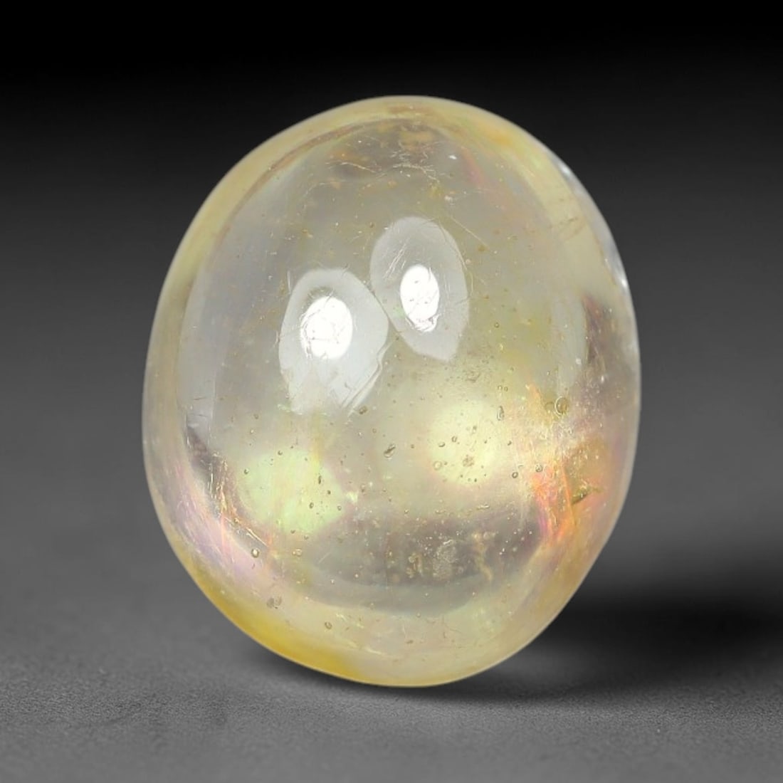 2.55ct Natural Sri Lankan Padparadscha Sapphire Loose Gemstone, 68BF: This fully polished Padparadscha sapphire features soft warm peach-orange blended body tone, with faint natural mineral traces scattered throughout its crystalline interior, measured at calibrated dim