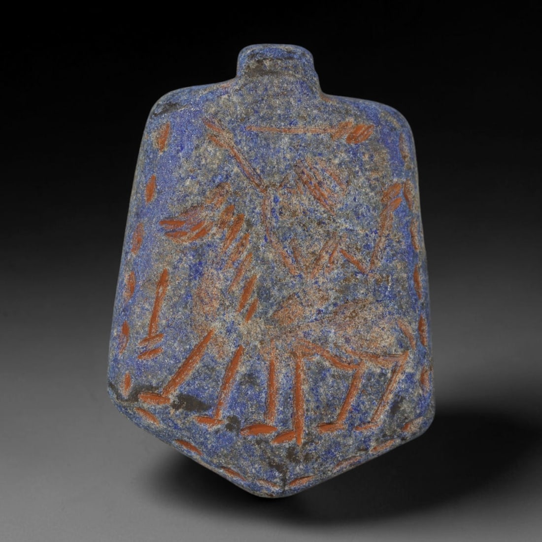 Ancient Sasanian Lapis Lazuli Hand Carved Amulet, 68AP: Antique wearable protective amulet fully carved from solid natural lapis lazuli stone, originating from the historic Sasanian Empire cultural sphere. Lapis lazuli was an immensely valued sacred stone 