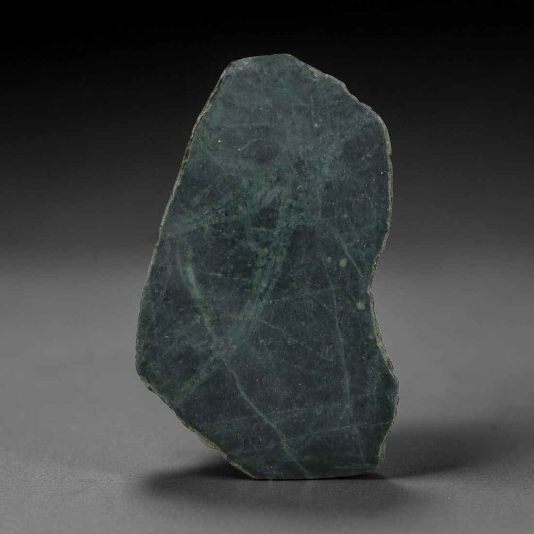226ct Natural Type A Burmese Jadeite Jade Sliced Rough, 47FD: This specimen is a sliced rough block of natural Type A Burmese jadeite jade. The interior displays natural colour zoning with visible mineral veining and crystalline patterns typical of unprocessed j