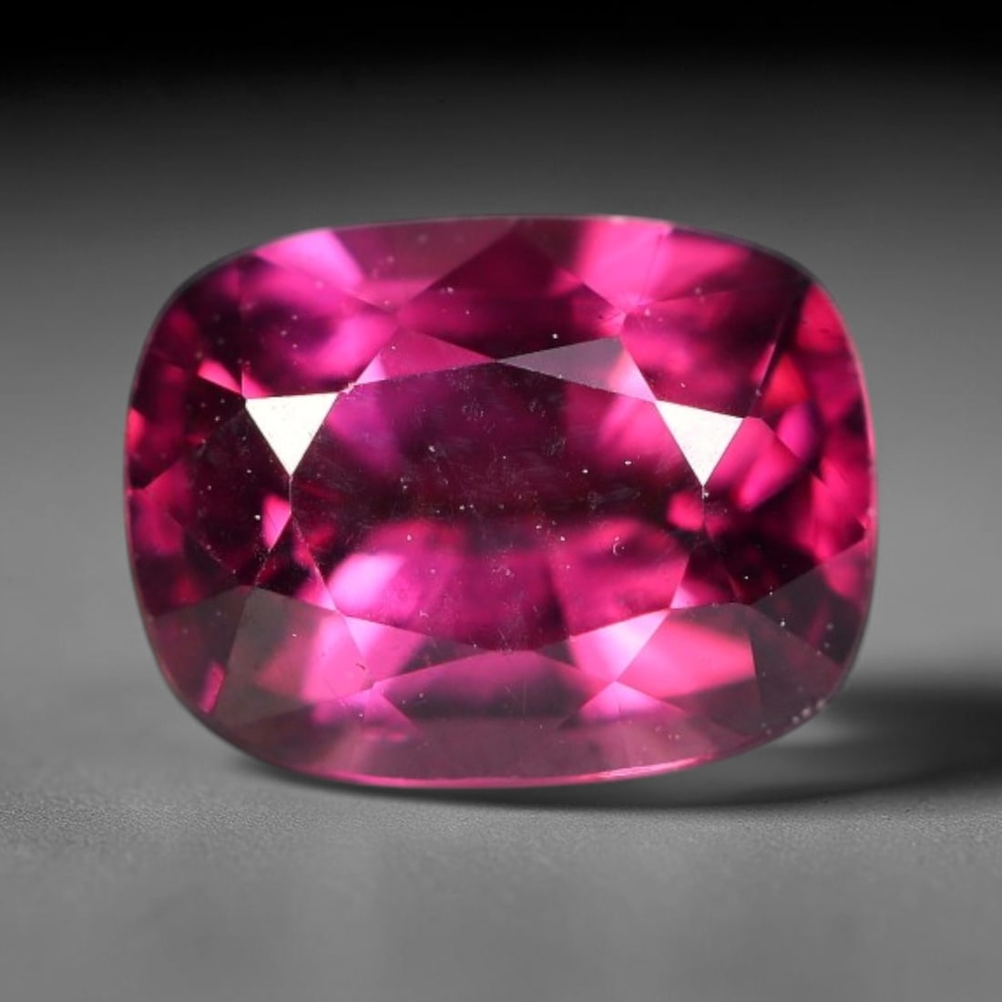 1.08ct Natural Tanzanian Rhodolite Garnet Loose Gemstone, 17BW: This natural rhodolite garnet originates from Tanzania, featuring well finished faceting that enhances light performance within the transparent crystal. Dimensions measure 6.6x5x3.4mm, fully polished 