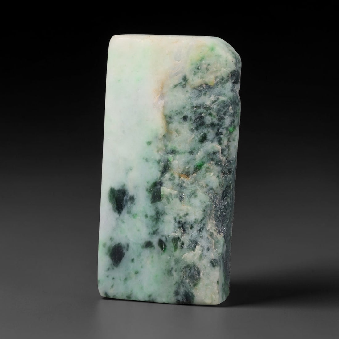 295ct Natural Type A Burmese Jadeite Jade Sliced Rough, 52FD: This specimen is a sliced rough block of natural Type A Burmese jadeite jade. The interior displays natural colour zoning with visible mineral veining and crystalline patterns typical of unprocessed j