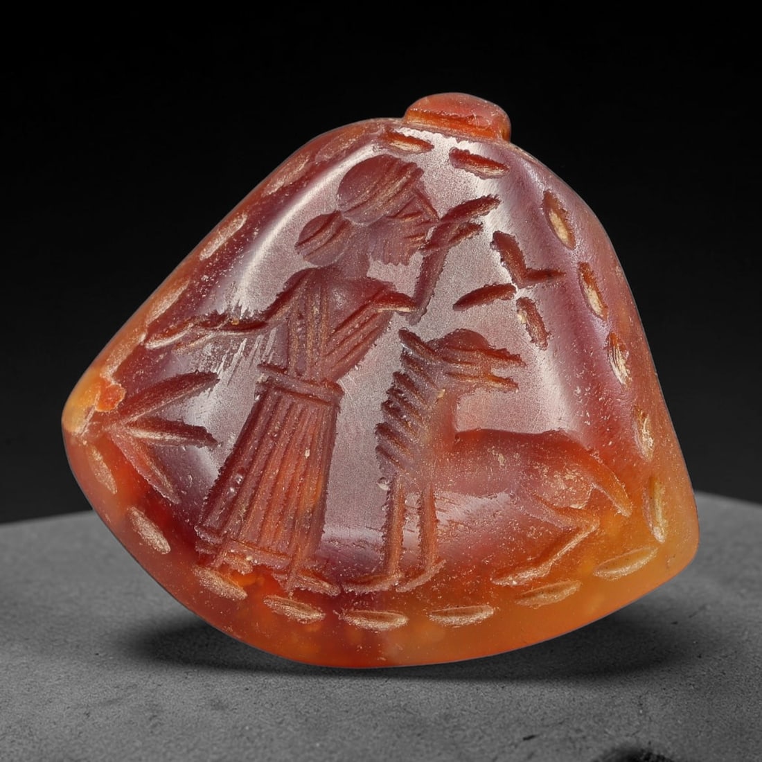 Vintage Natural Carnelian Agate Revival Indo-Persian Glyptic Figural Talisman Amulet Plaque, 11FL: This vintage talisman pendant plaque is skillfully carved from natural banded carnelian agate, crafted in a style referencing ancient Indo-Persian glyptic art traditions. The face bears detailed relie
