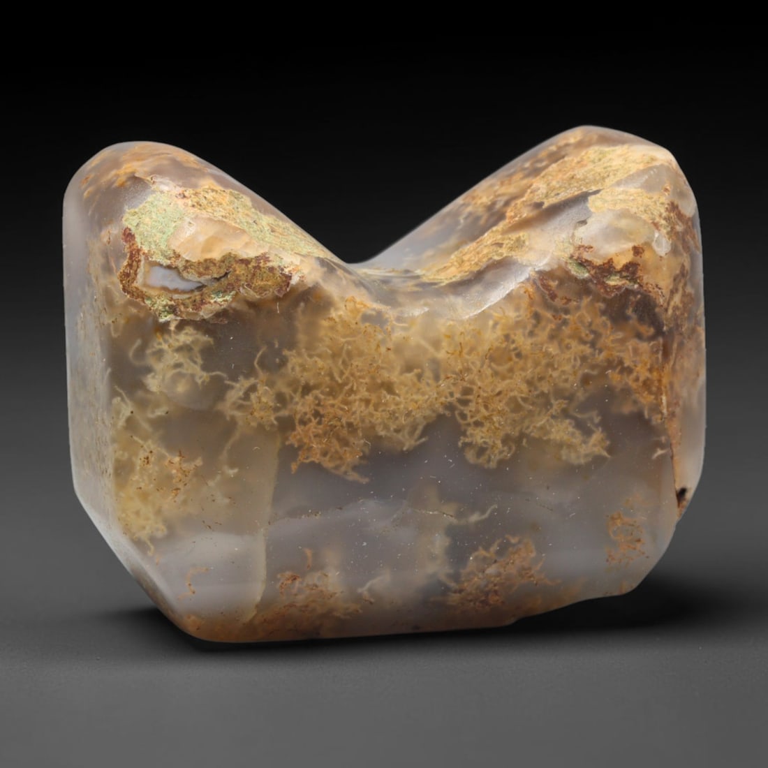 Ancient Medieval Mamluk Period Moss Agate Talisman (c.13th-16th Century CE), 86EC: This talismanic piece is crafted from natural moss agate featuring distinctive dendritic mineral inclusions. Formed into a notched organic silhouette, the stone displays natural mineral encrustations 